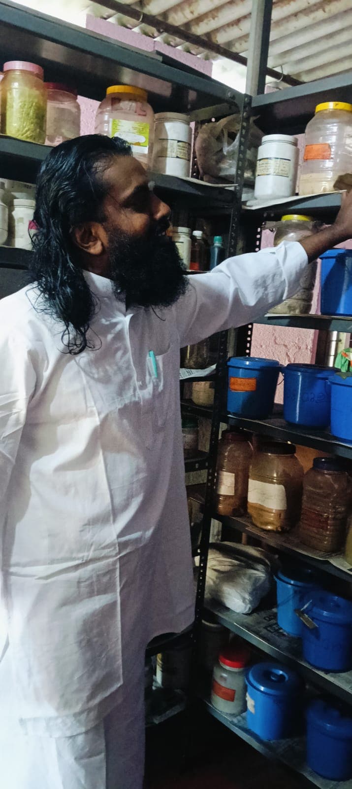 Vaidyar at the herbal pharmacy